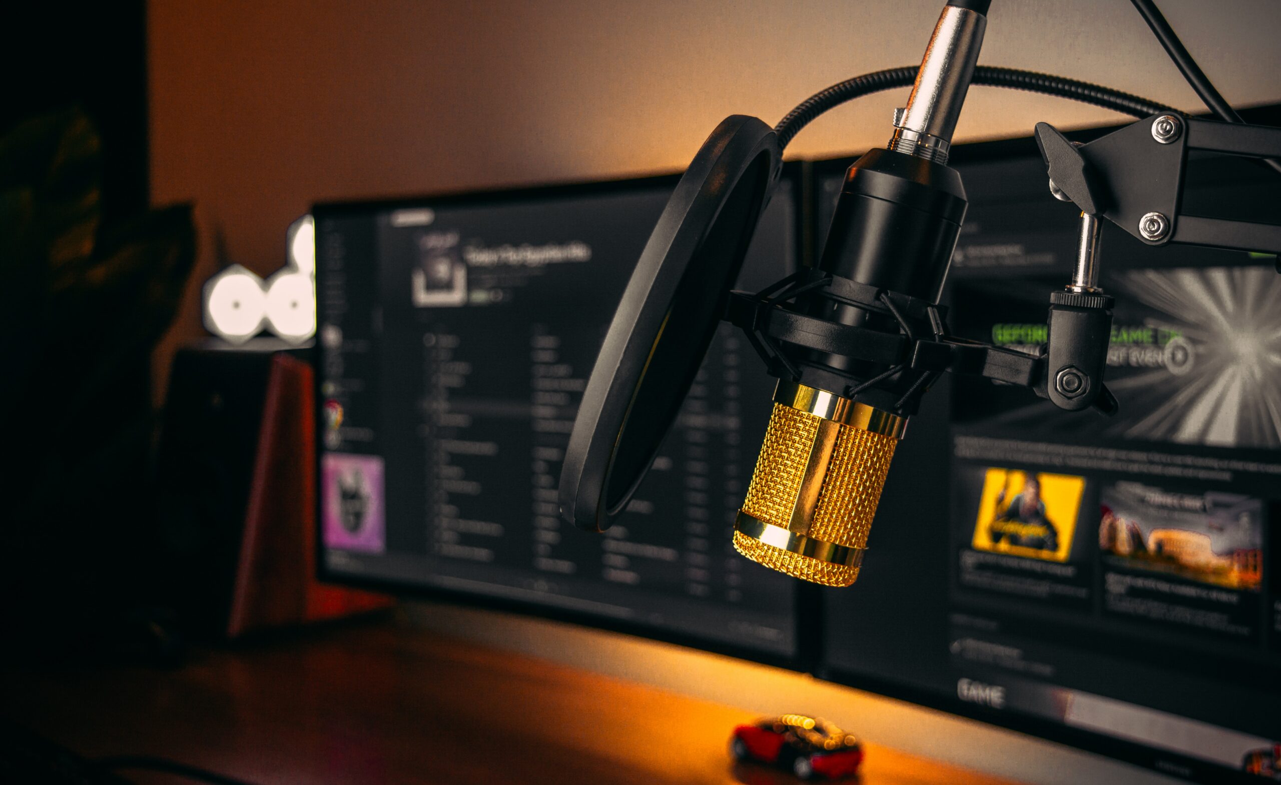 pro podcast setup with gold microphone hanging